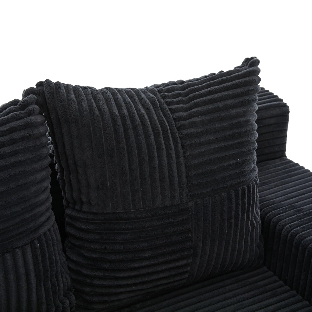 Divano pouf 151x133x64 cm con tasche laterali in velluto a coste nero