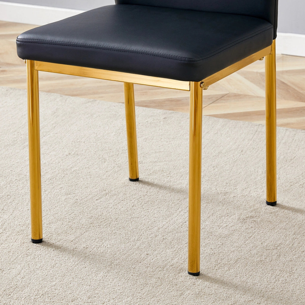 Set di 4 sedie da pranzo in PU nero e metallo oro; altezza 93 cm