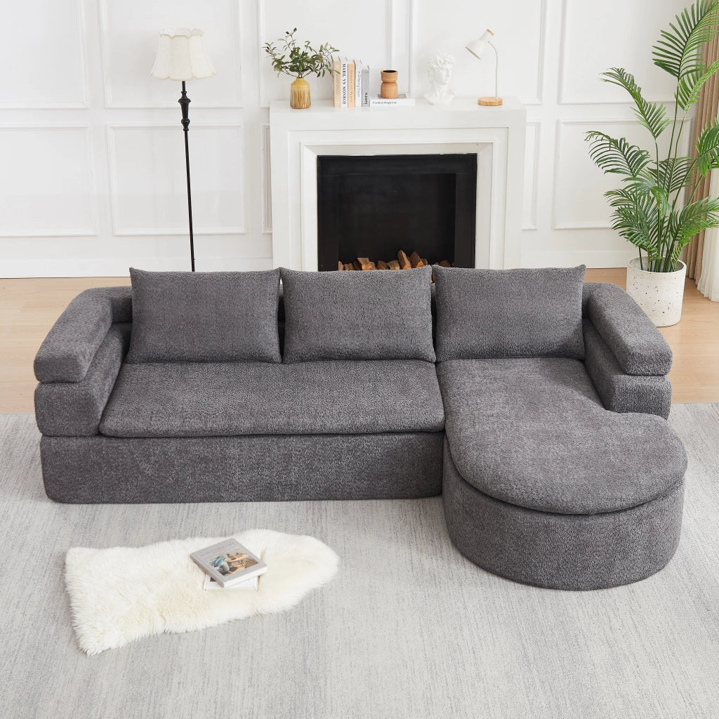 Divano angolare con chaise longue in chenille con bracciolo a gradini e schienali imbottiti grigio antracite