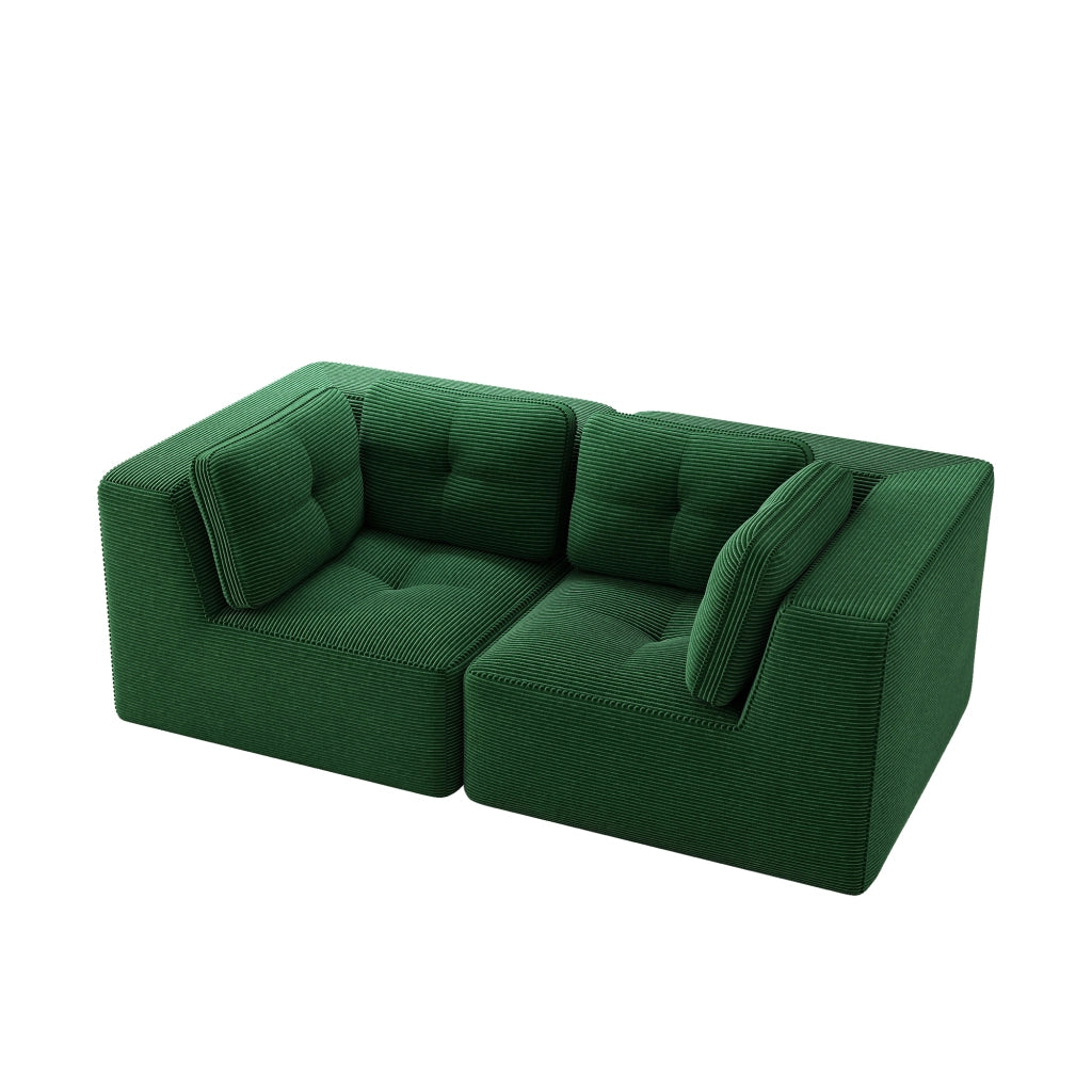 Divano angolare modulare senza struttura, rivestito in corduroy verde, con seduta profonda e comfort soffice