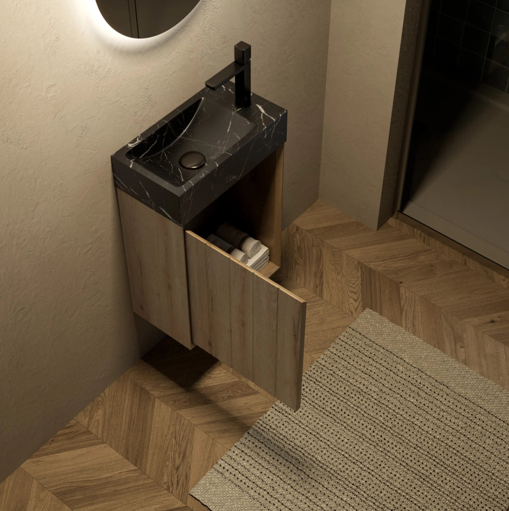 Mobile bagno compatto con lavabo integrato in marmo nero