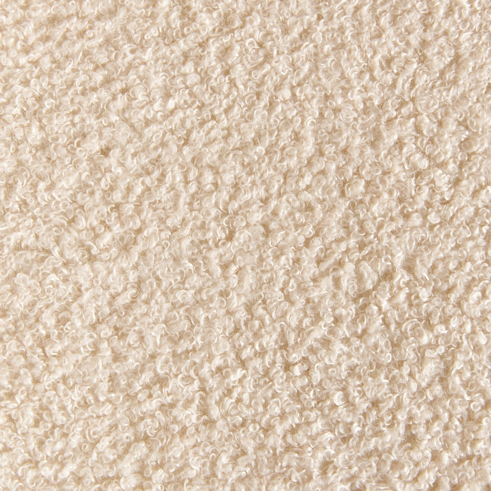 Poltrona da salotto con schienale curvo boucle beige stile glam elegante soggiorno