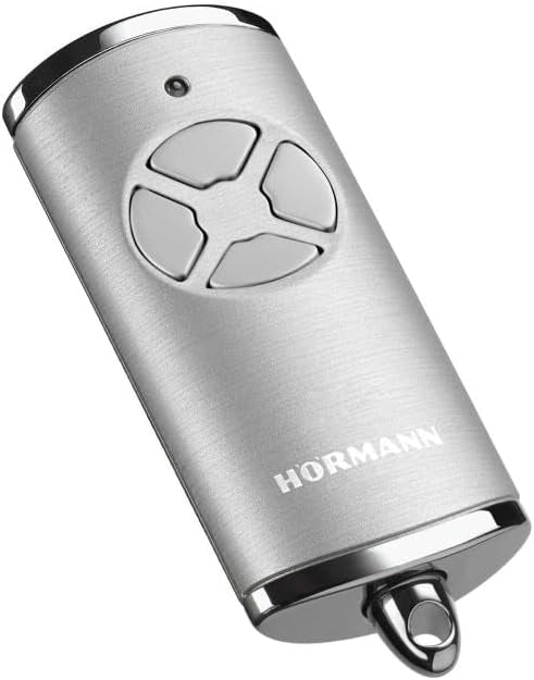 Trasmettitore manuale HSE 4 BS (frequenza 868 MHz, bianco lucido, azionamento per porta del garage con tappi cromati, batterie, dimensioni 28 x 70 x 14 mm, anello portachiavi) 4511565