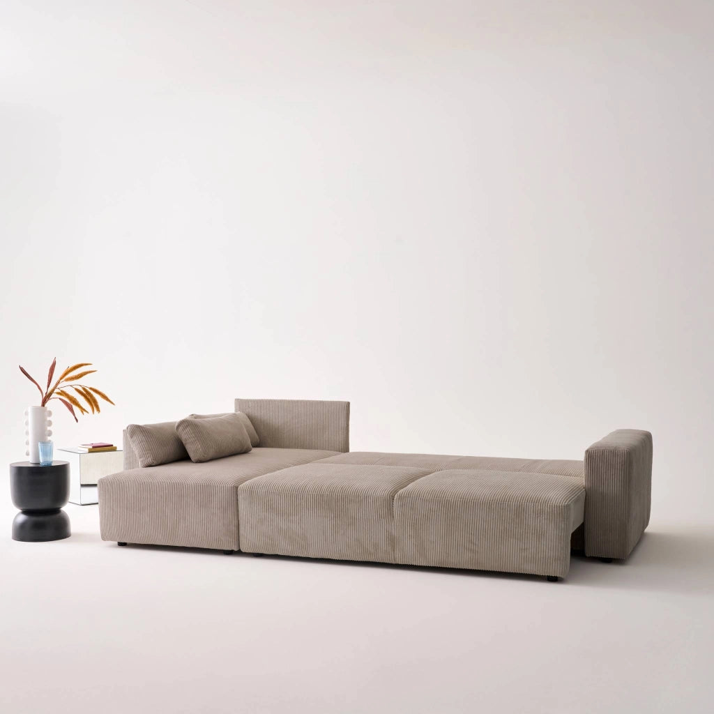 Divano letto angolare reversibile con contenitore in velluto a coste,