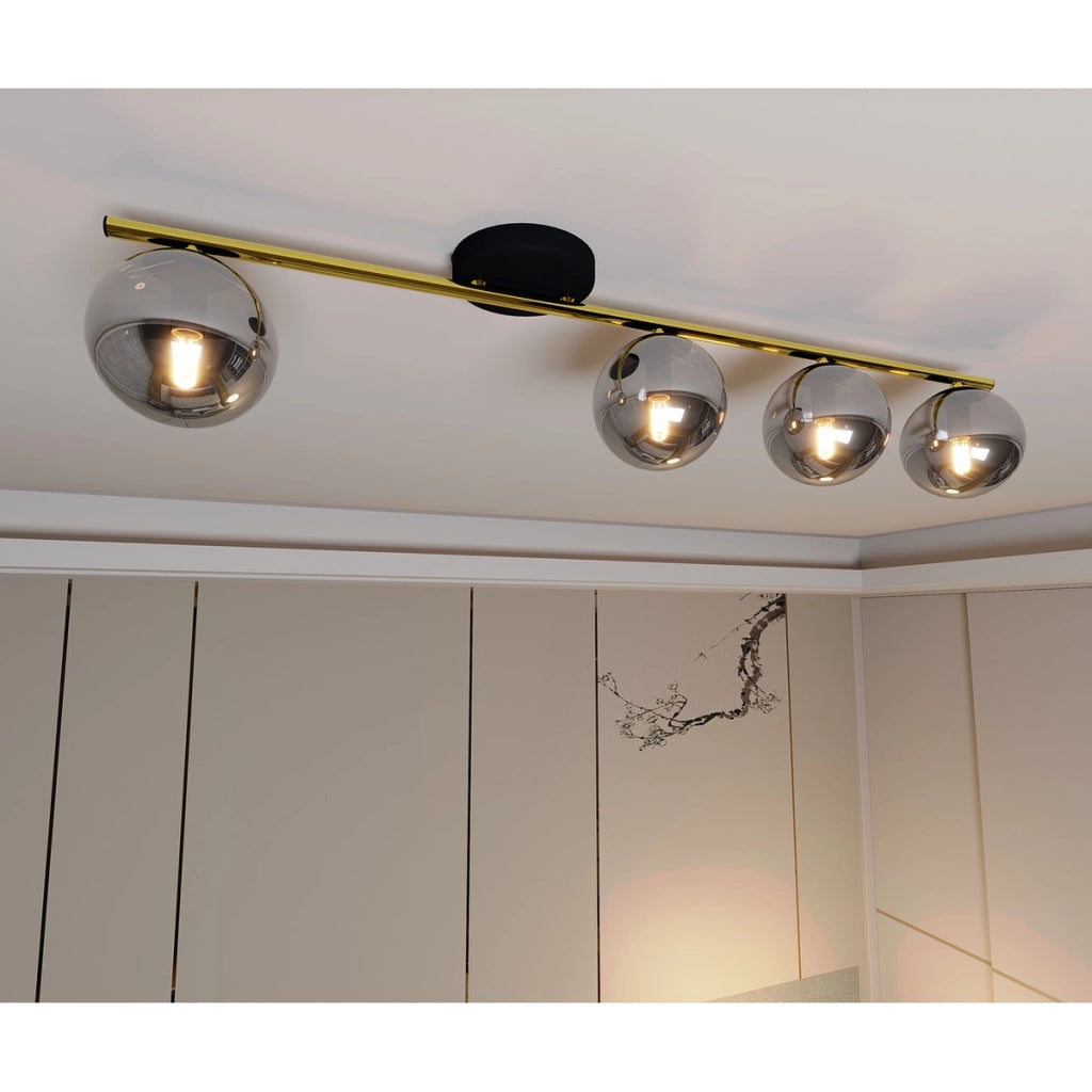 Lampada a sospensione Monza in acciaio oro e nero con diffusori in vetro