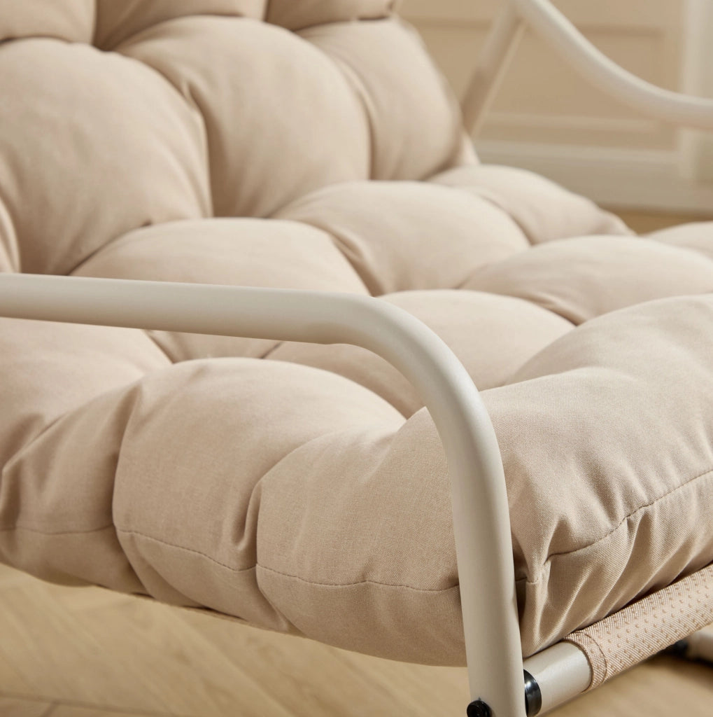 Sedia a dondolo da esterno in acciaio con cuscino spesso; beige