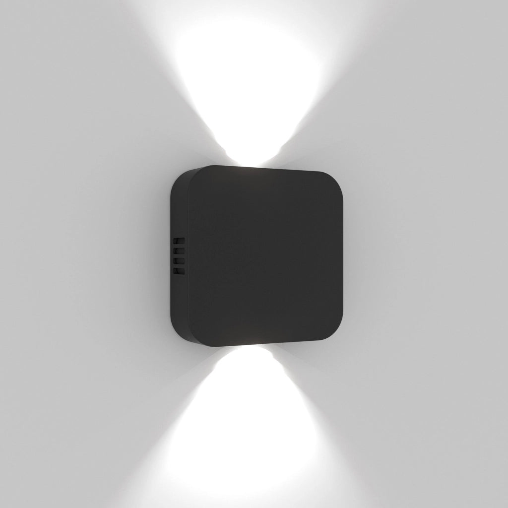 Lampada da parete Roller in alluminio pressofuso, nero opaco, design orientabile 90 gradi con doppia emissione LED 3000K, protezione IP54 per esterni