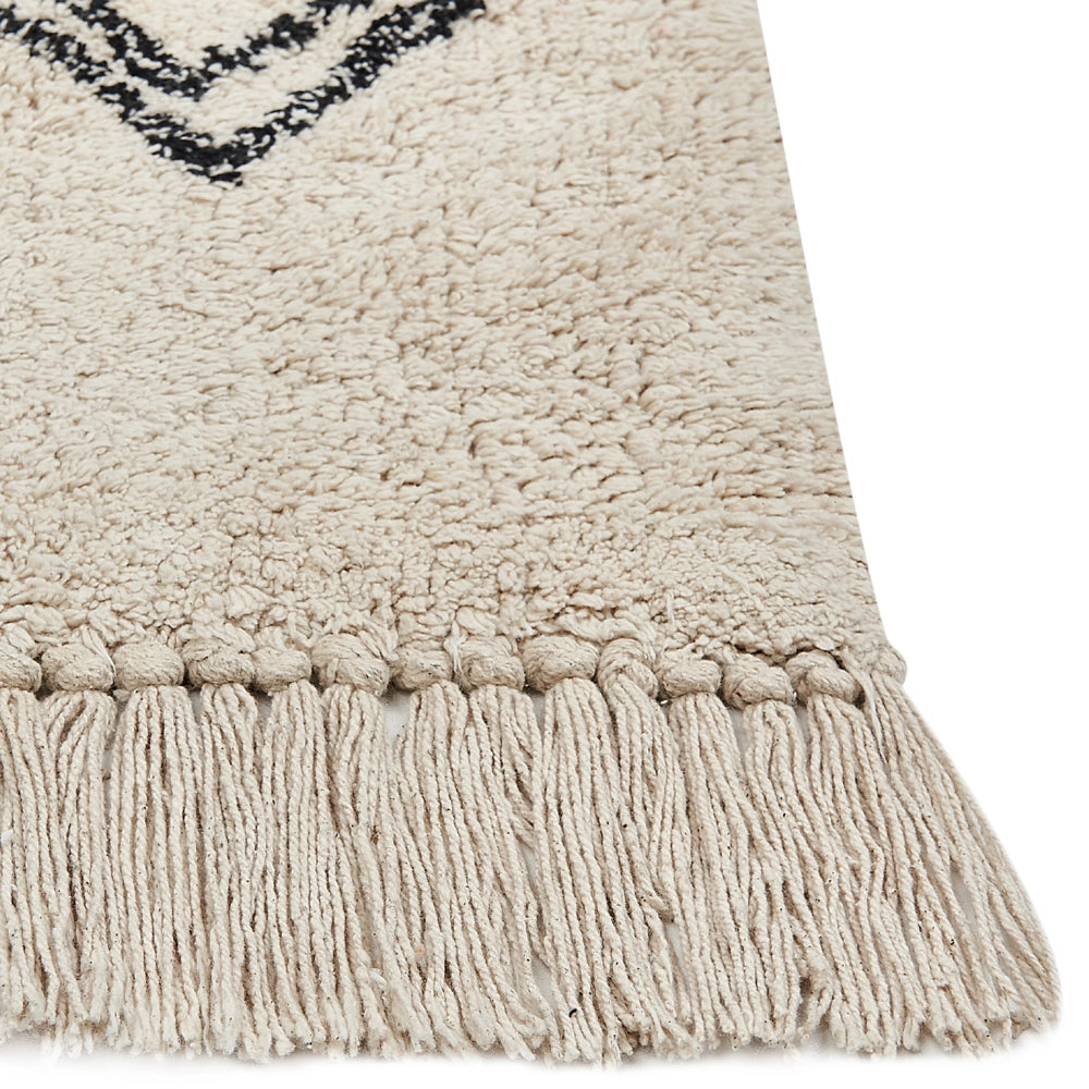 Tappeto in cotone beige con motivo geometrico e nappe 160 x 230 cm camera da letto soggiorno