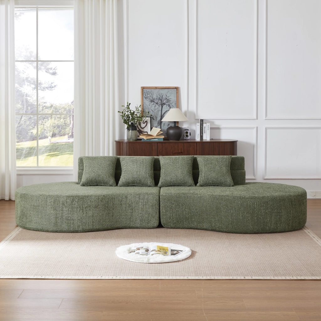 Divano modulare in schiuma con design curvo e schienale a strati, divisibile in due, rivestimento in ciniglia verde