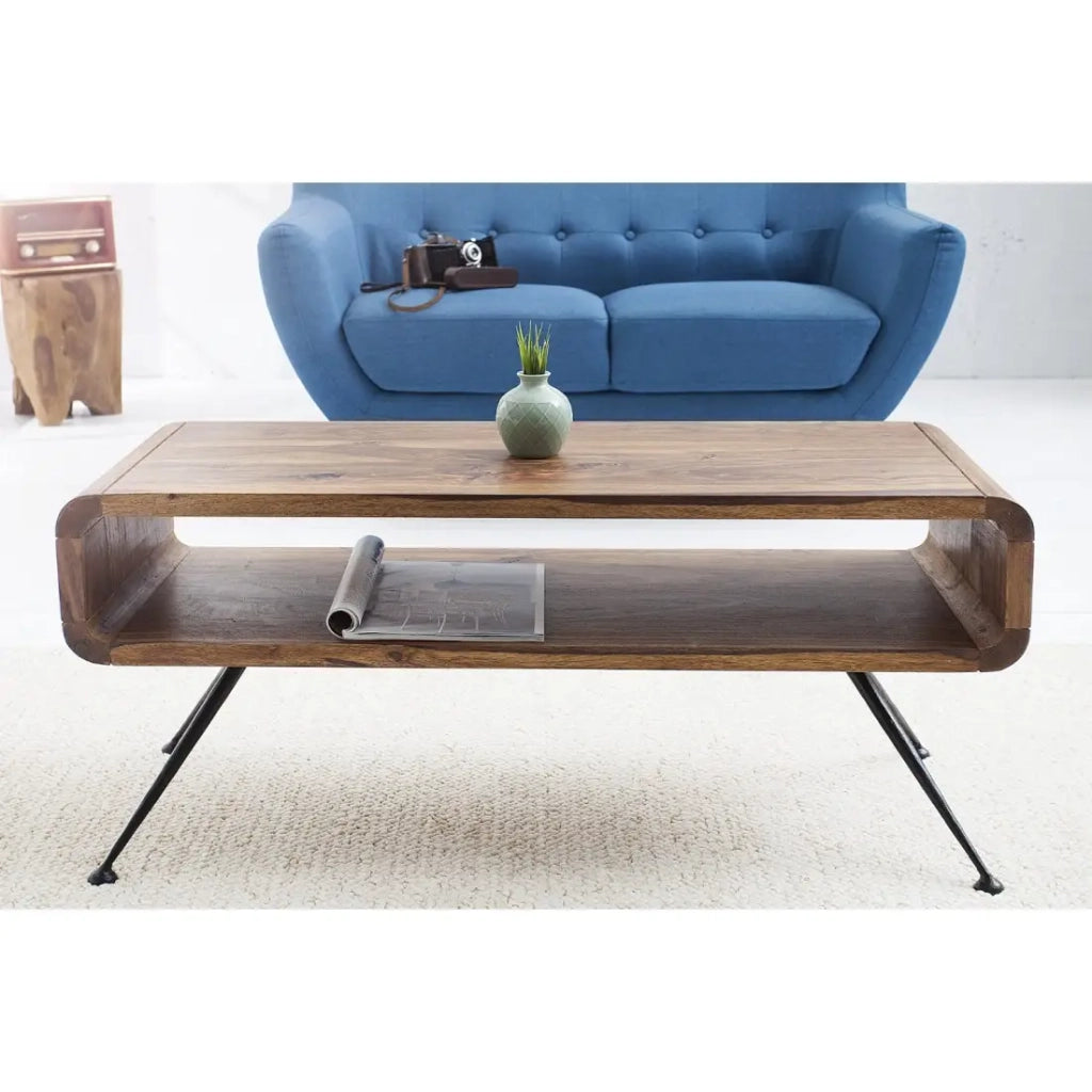 Tavolino basso RETROVA 100 cm in legno di Sheesham verniciato con gambe in metallo nero e spazio di stoccaggio