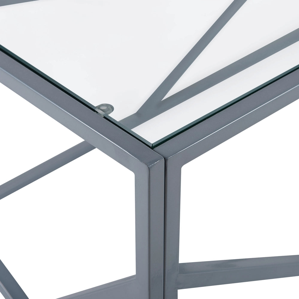 Tavolino da caffè con struttura in metallo argento piano in vetro design geometrico glam