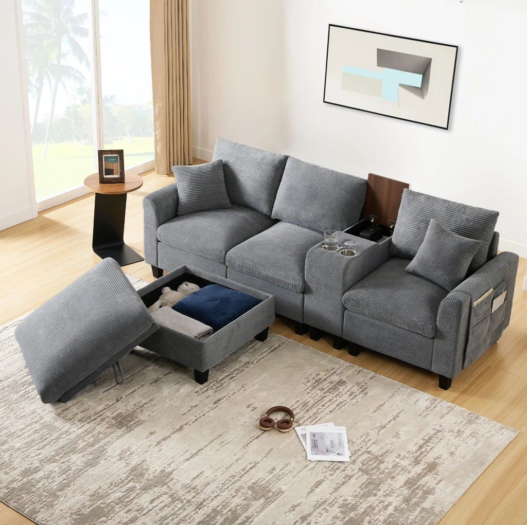Divano angolare modulare 4 posti in velluto a coste grigio con pouf; console; USB e portabicchieri