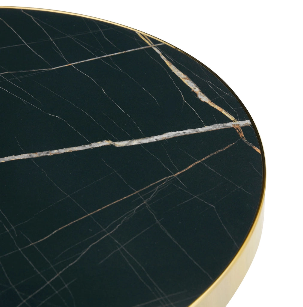 Tavolino rotondo nero e oro con piano effetto marmo