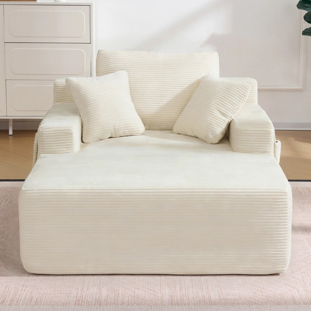 Divano compatto in velluto a coste beige con tasche laterali
