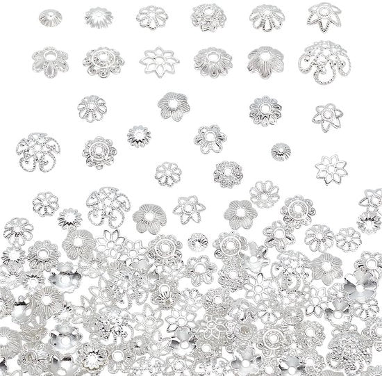Capsule per gioielli 120 pezzi - Legerante - Capsule in forma di fiore - Spaziatori - Capsule per finire i gioielli - Per la creazione di gioielli - Argento 

Nota: Sostituito "Zilver" con "Argento" per adattarsi al mercato italiano.