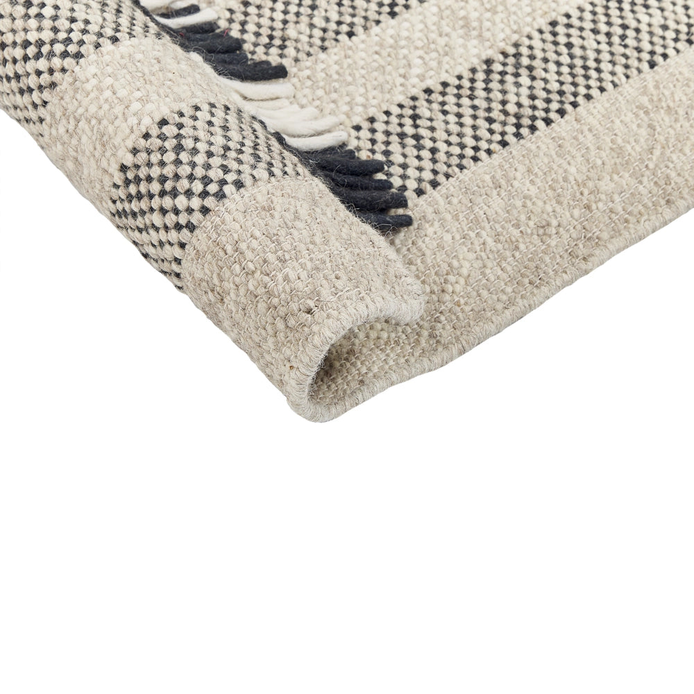 Tappeto in lana bianco sporco nero 80 x 150 cm fatto a mano con nappe moderne