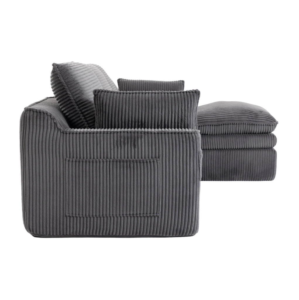 Divano modulare ULEVR 263x167x85 cm con pouf, tasche laterali e cuscini, velluto a coste grigio scuro