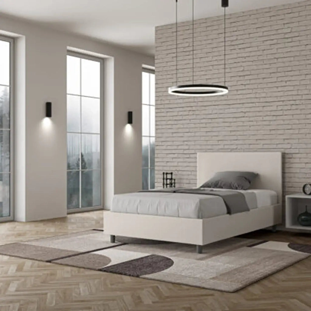 Letto una piazza e mezza contenitore imbottito 120x210 similpelle bianco Adele