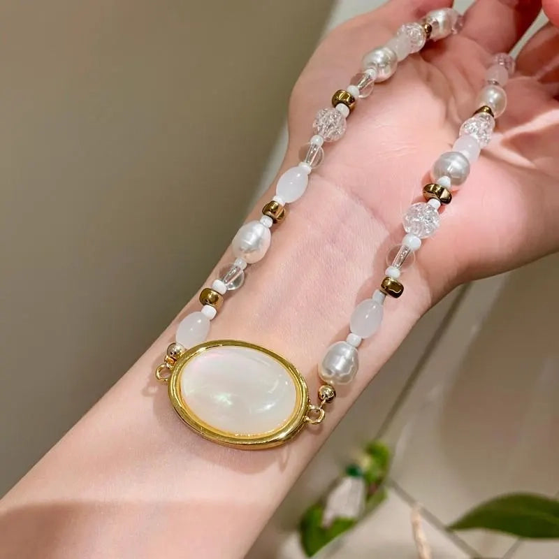 Collana ovale con perline di cristallo fatta a mano, regalo di Natale o di compleanno.