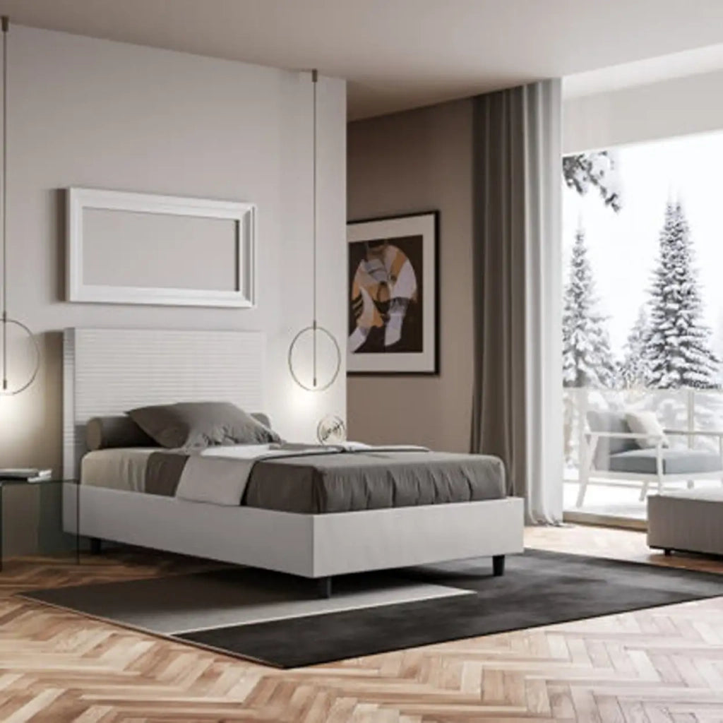 Letto una piazza e mezza contenitore imbottito 120x190 similpelle bianco Focus