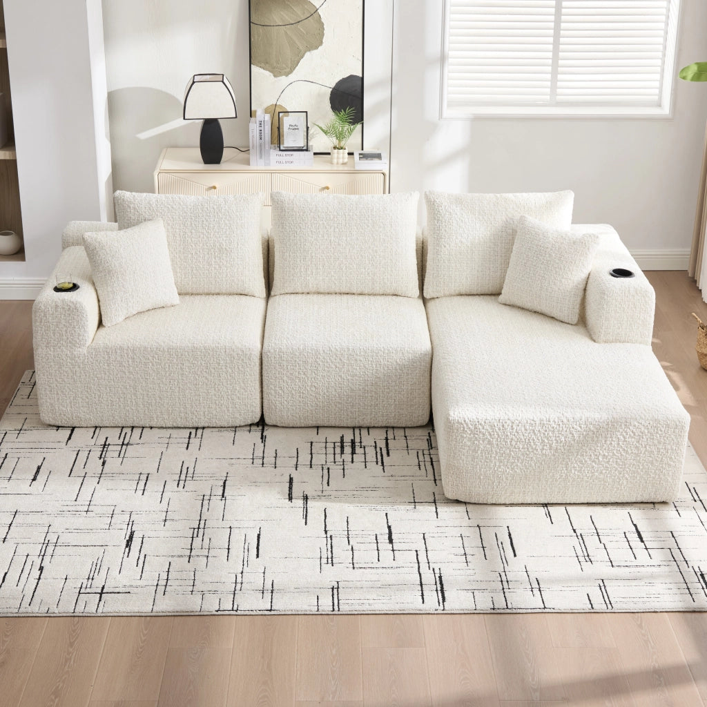 Divano angolare modulare in ciniglia con tasche laterali e seduta ampia, senza montaggio, beige 261 × 165 × 80 cm