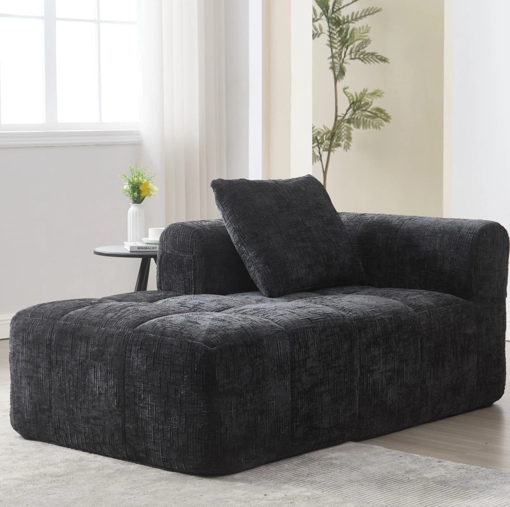 Divano Chaise Longue imbottito con tessuto Chenille nero, 158x90x60 cm, con cuscino e tasche laterali