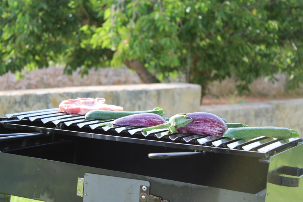 BARBECUE FERRO TIPO PESANTE 70x35cm CON GRIGLIA RECUPERA GRASSI REGOLABILE