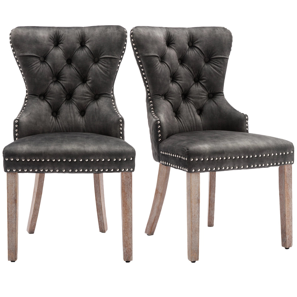 Sedia da pranzo imbottita con gambe regolabili, borchie decorative e anello posteriore, in velluto grigio