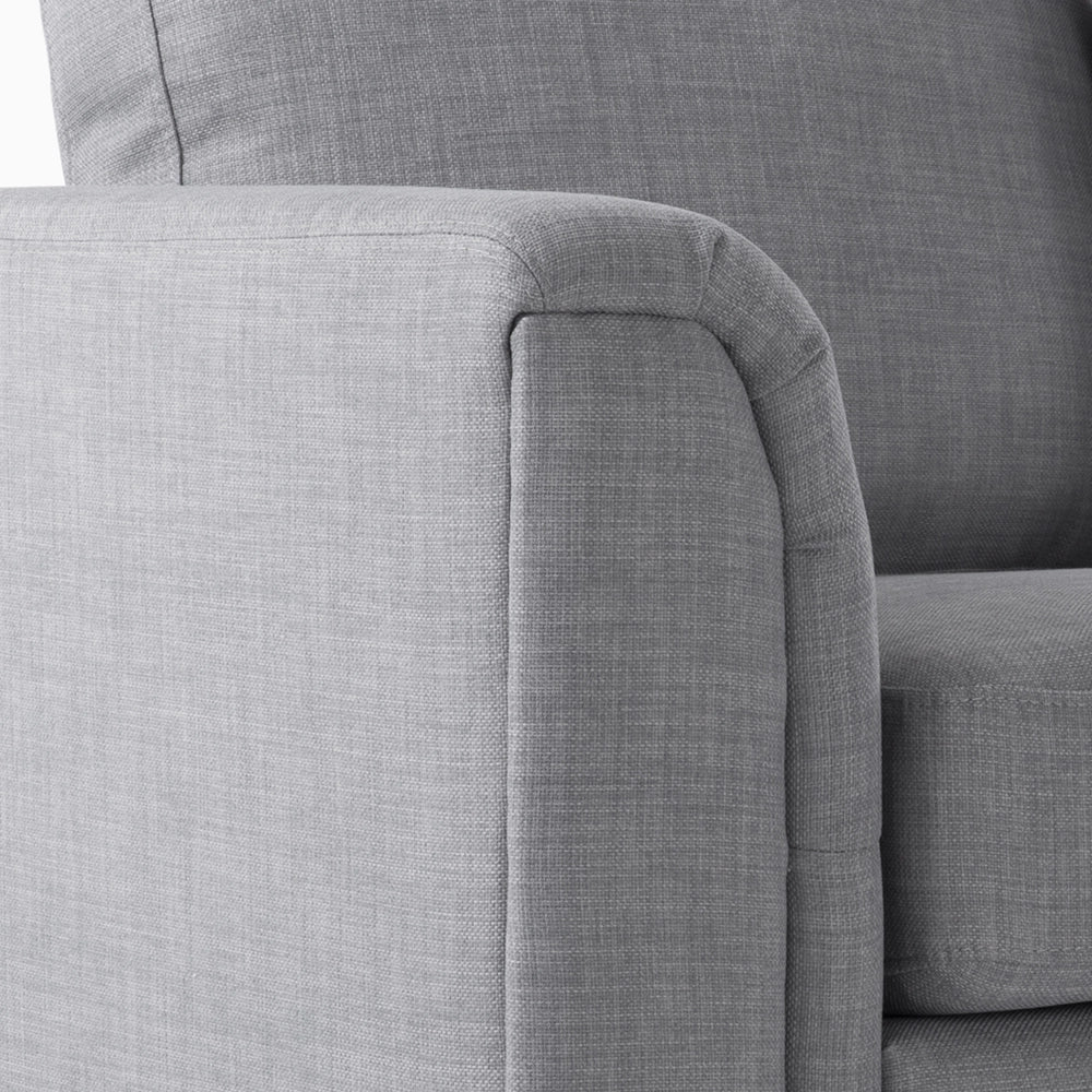 Divano ad angolo con rivestimento in tessuto grigio chiaro a forma di L con orientamento a versione sinistra