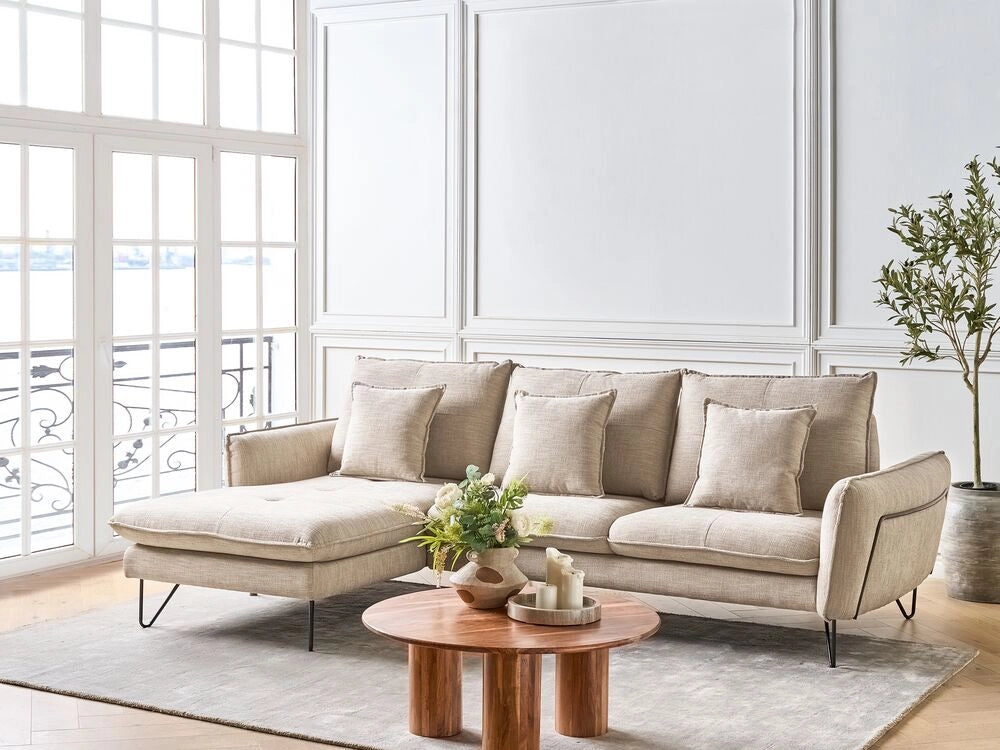 Divano 3 posti angolare rivestito in tessuto beige lato destro regolabile stile moderno design classico