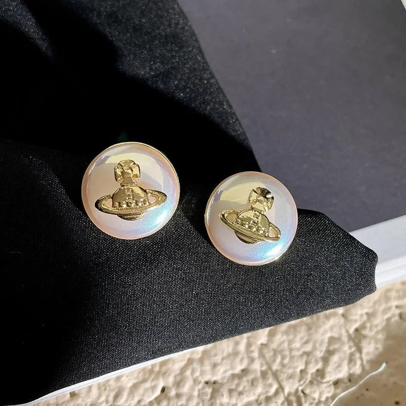 Set di collana, bracciale e orecchini di perle fatti a mano: gioielli con perline.