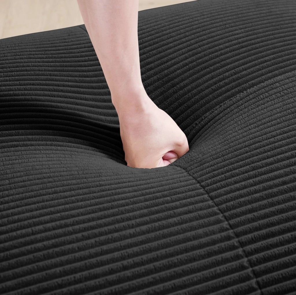 Divano angolare modulare in tessuto a coste con schienale ergonomico; nero