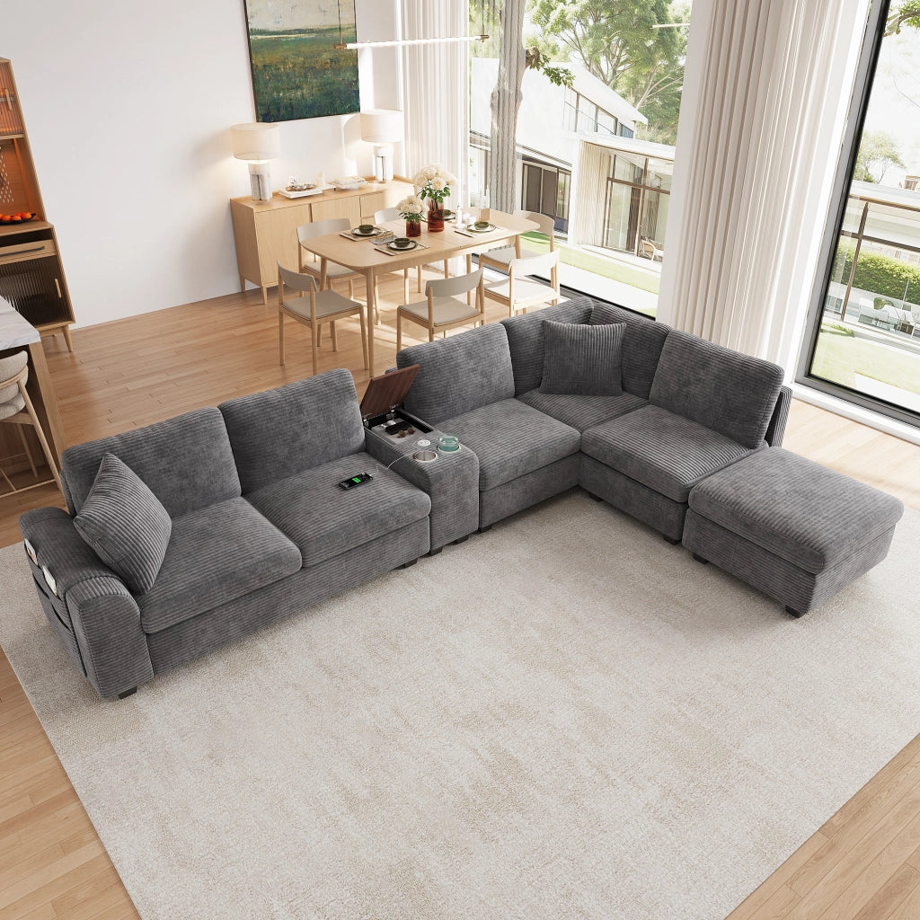 Divano angolare modulare 6 posti con ottomana contenitore console mobile e porte USB in corduroy grigio