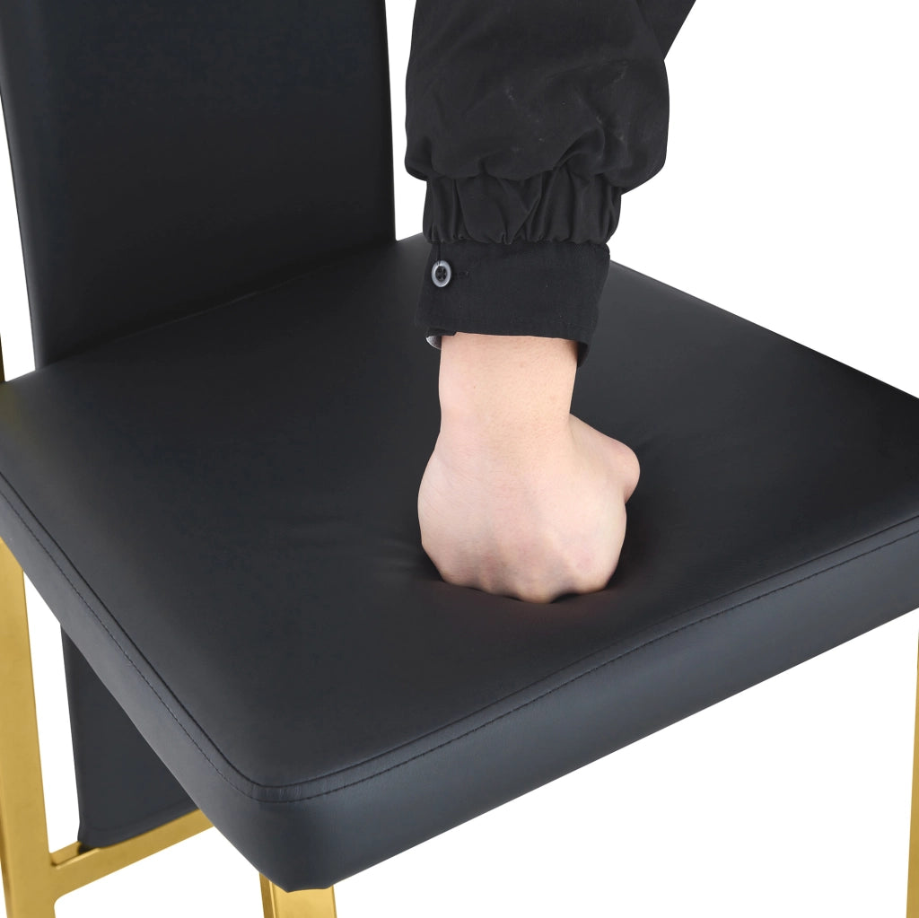 Set di 4 sedie da pranzo moderne con bordo dorato; 109 cm; in PU nero e metallo dorato