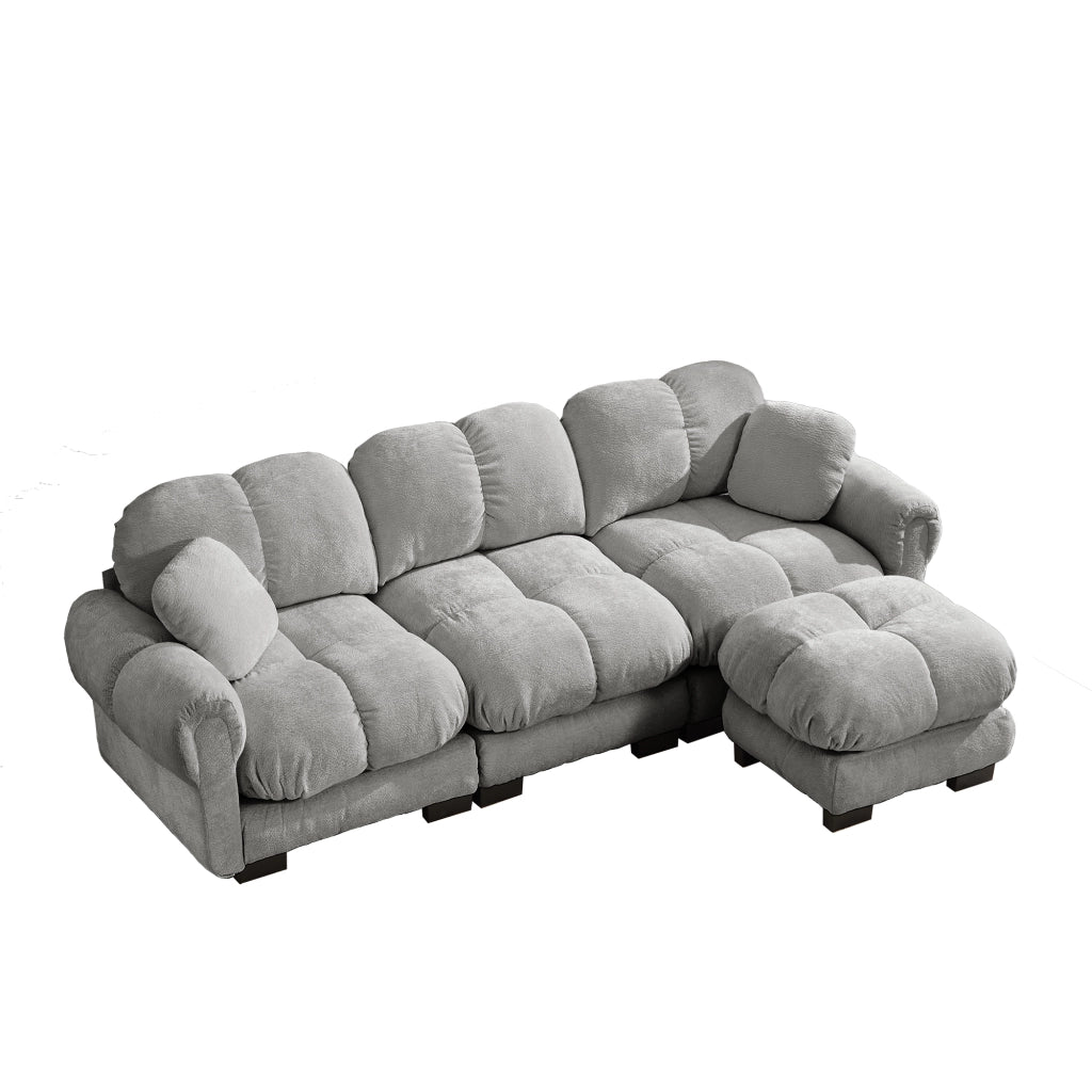 Divano angolare modulare con pouf mobile e cuscino di supporto; seduta trapuntata in chenille grigio chiaro