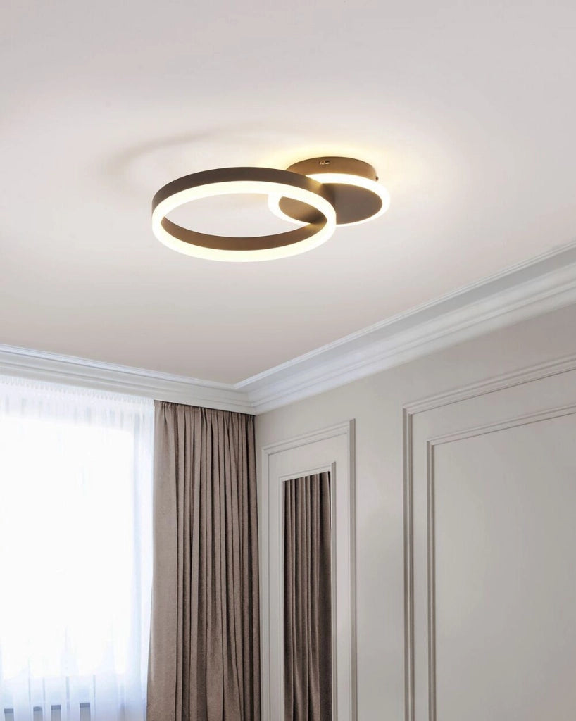 Plafoniera dalla forma circolare con luci LED in metallo marrone glamour minimalista