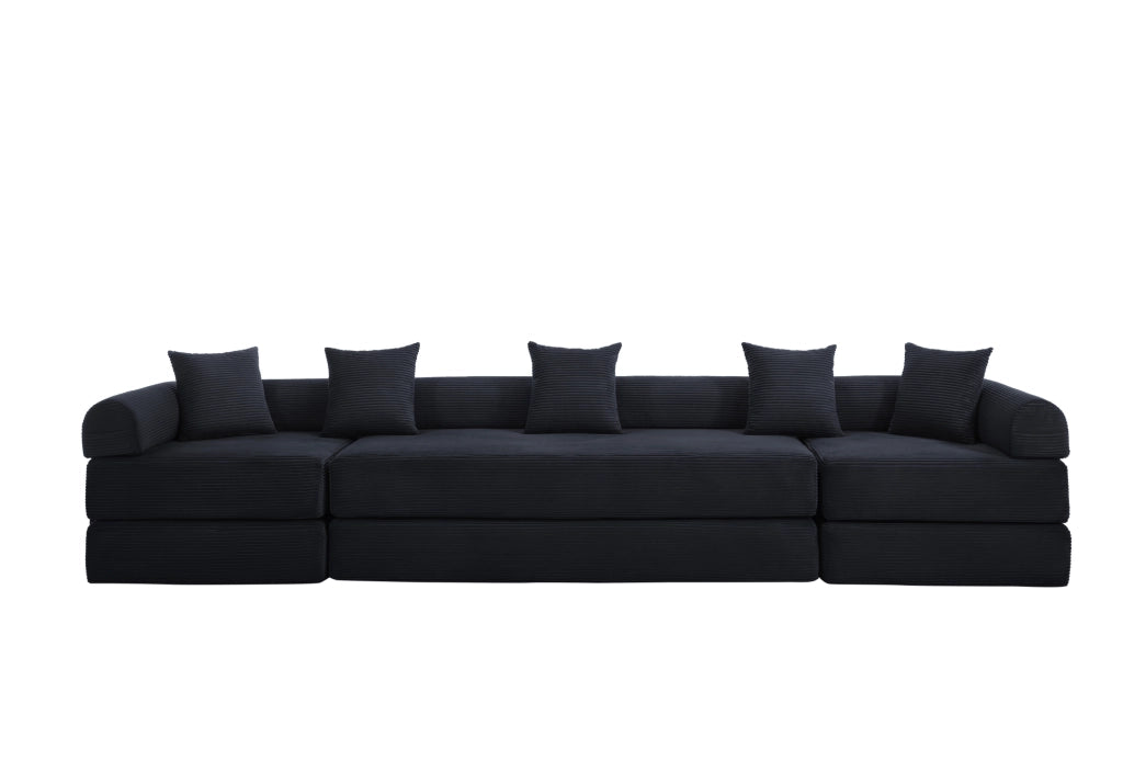 Divano modulare 270x180x64 cm trasformabile in letto con tasca laterale in velluto a coste nero