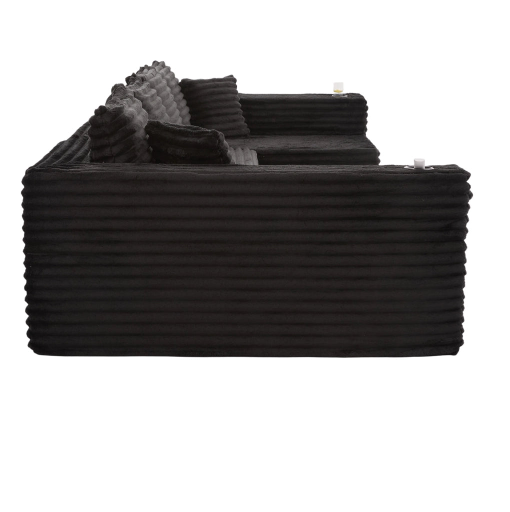 Divano modulare a U ULEVR 320x155 cm in velluto a coste nero, portabevande, tasca laterale e 6 cuscini