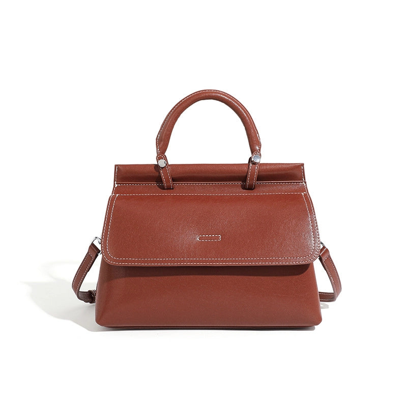 Borsa a mano da donna in vera pelle, colore marrone.