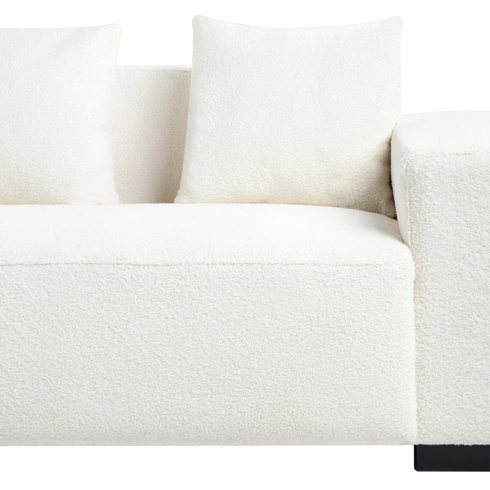 Divano angolare 4 posti in tessuto bouclè bianco lato destro forma a L stile elegante