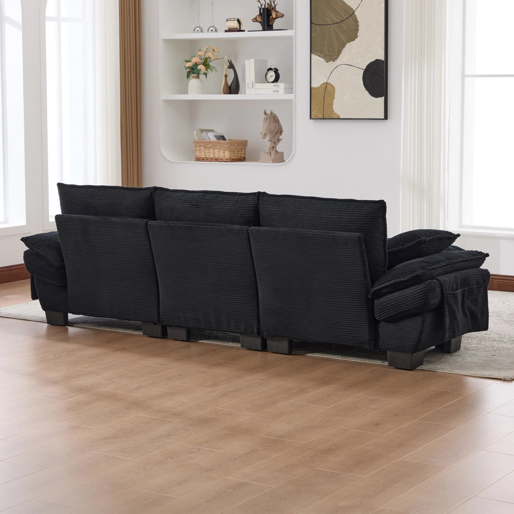 Divano modulare 3 posti in velluto a coste nero con pouf; porta USB-C e tasche laterali; 260x132x84 cm