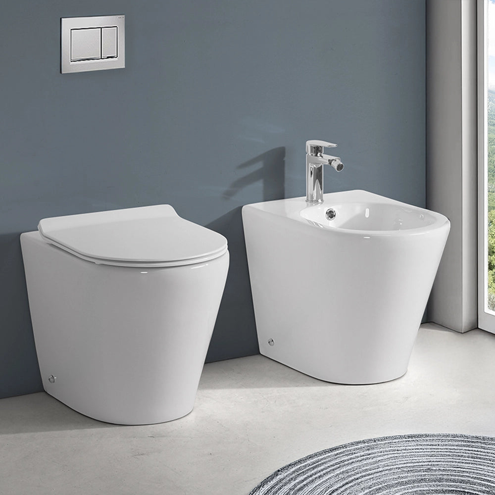 Copriwater bianco design tondo con chiusura soft close e sgancio rapido per sanitari Ukra