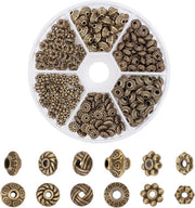Spaziatori tibetani in stile antico - 295 pezzi - spacer per bracciali DIY - bronzo - diverse forme - fettuccia metallica con foro 1-2mm.