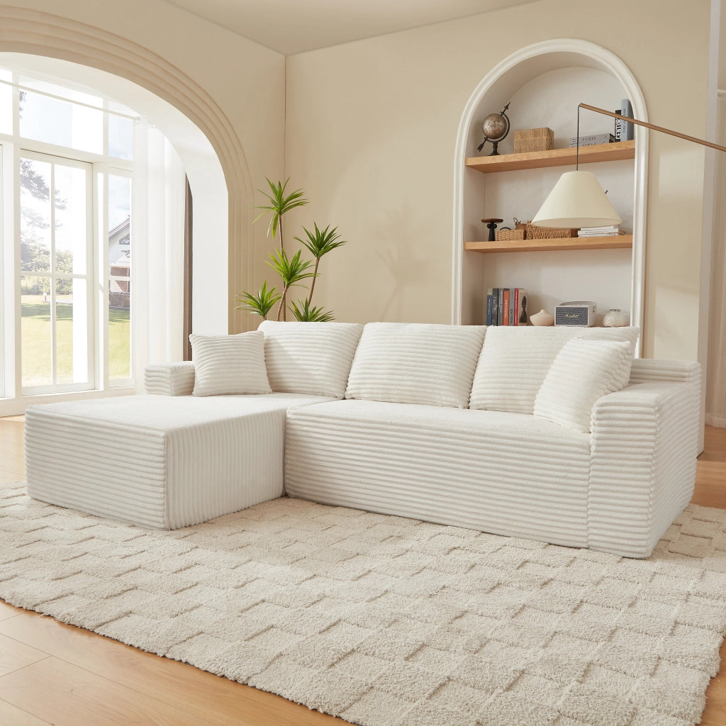 Divano modulare a L con sedute ampie e cuscini sfoderabili in schiuma e molle per salotto bianco 252.5 × 163.0 × 65.0 cm