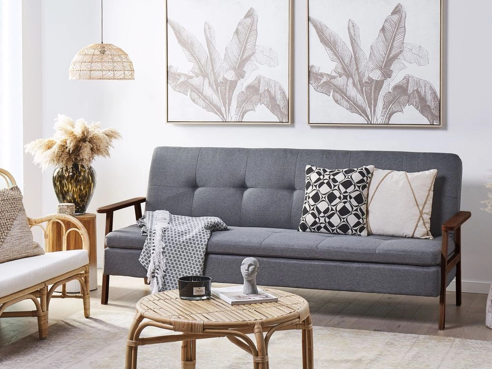 Divano letto moderno in tessuto grigio braccioli in legno scuro gambe trasformabili stile moderno
