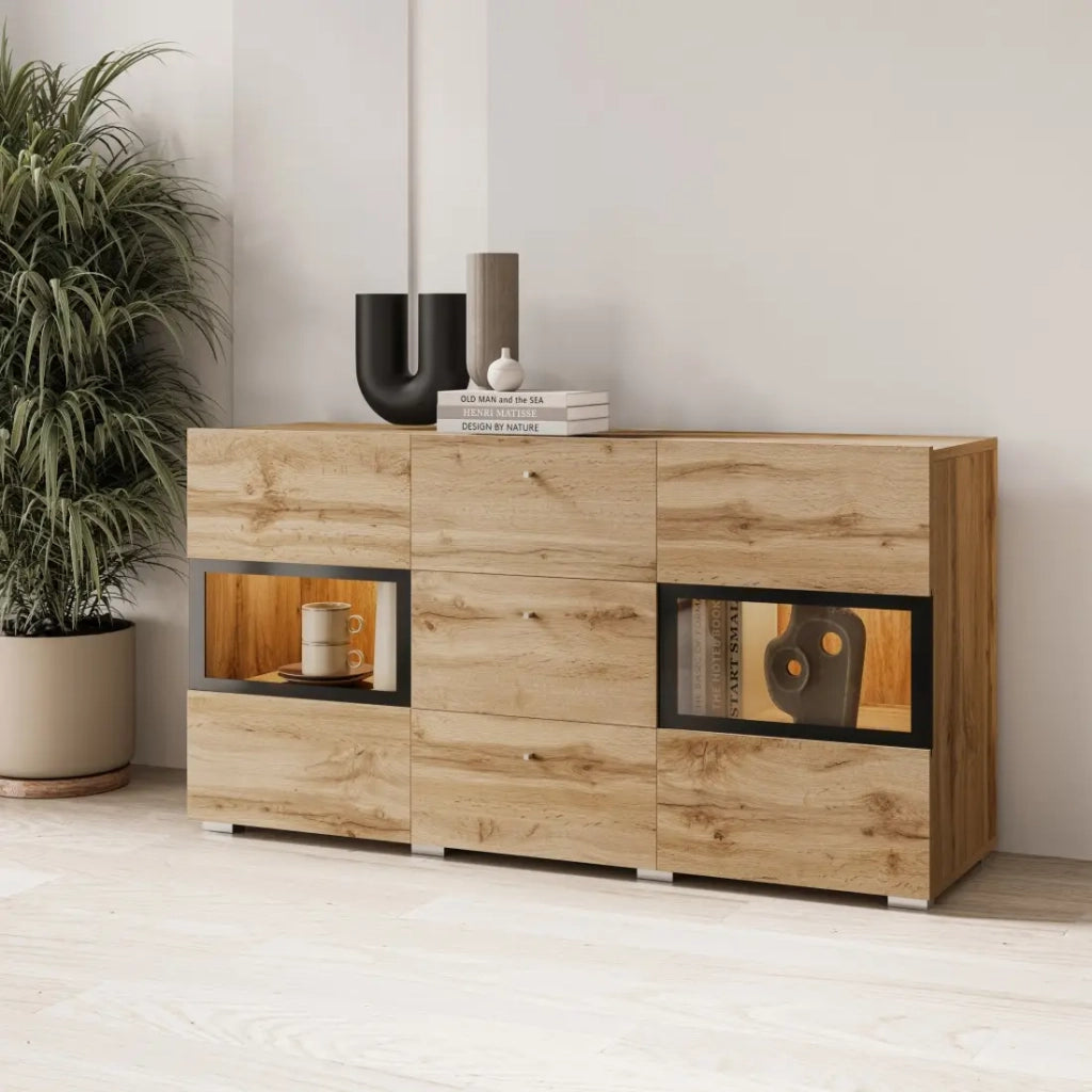 Buffet RAMOS 130 cm – Rovere dorato e nero – 2 porte in vetro e 3 cassetti – Senza LED