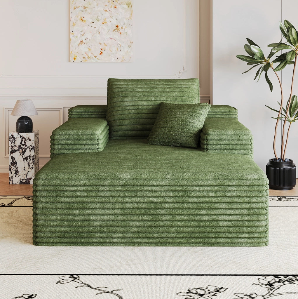 Divano modulare in tessuto corduroy verde, seduta profonda e comfort elevato