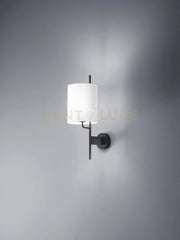 Applique Ram Hotel in metallo verniciato nero paralume tessuto bianco attacco E27