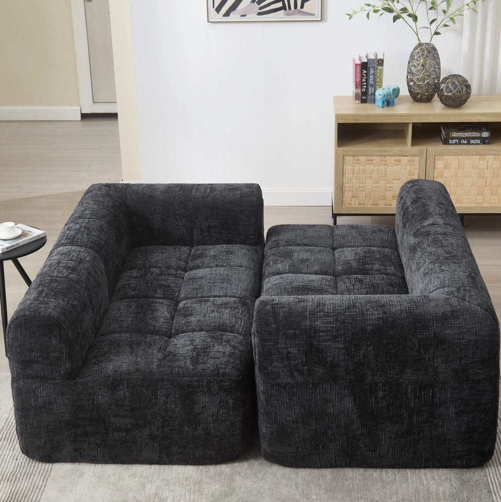 Divano angolare 250x158x60 cm con penisola; tasche laterali e 3 cuscini in chenille nero