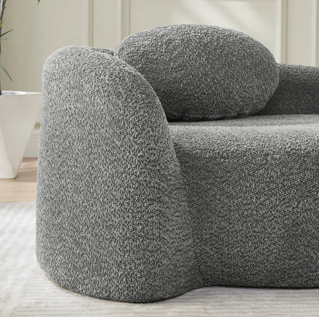 Divano compatto in tessuto Teddy grigio scuro con cuscino poggiatesta